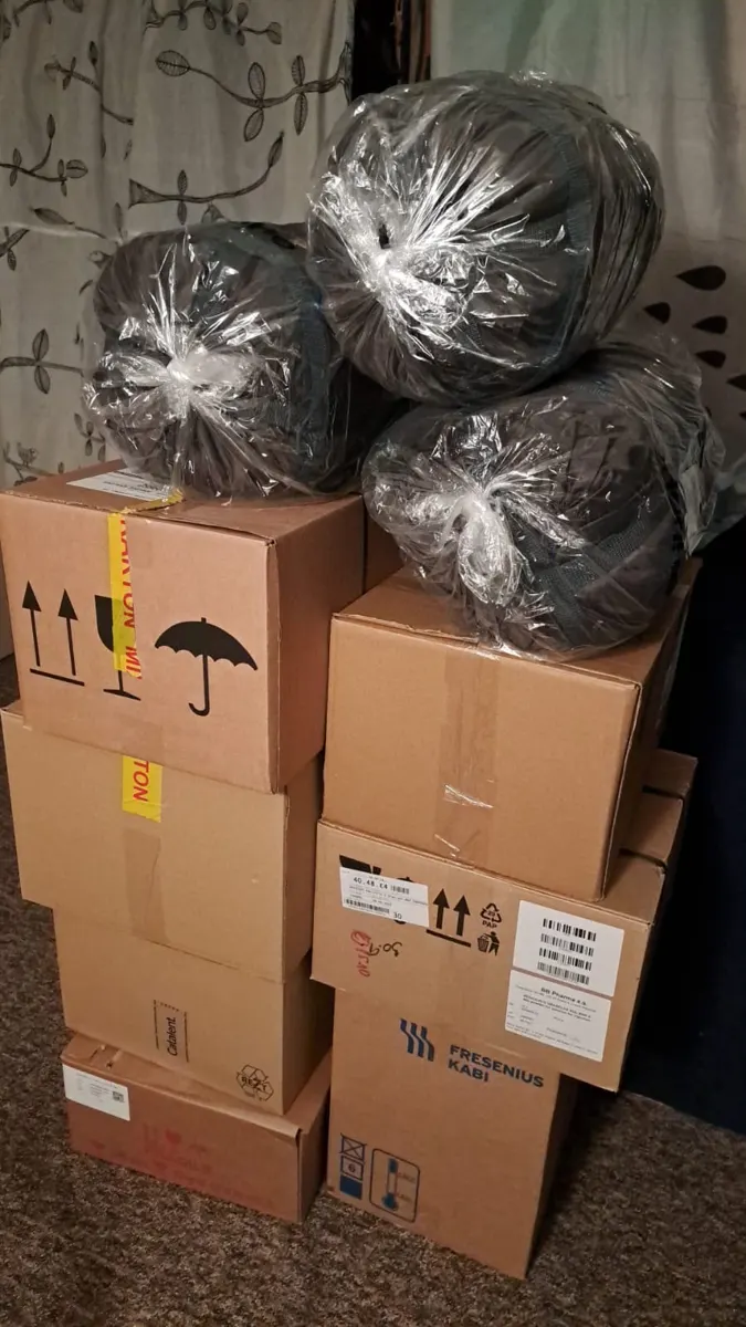 Sleeping bags and boxes ready to load