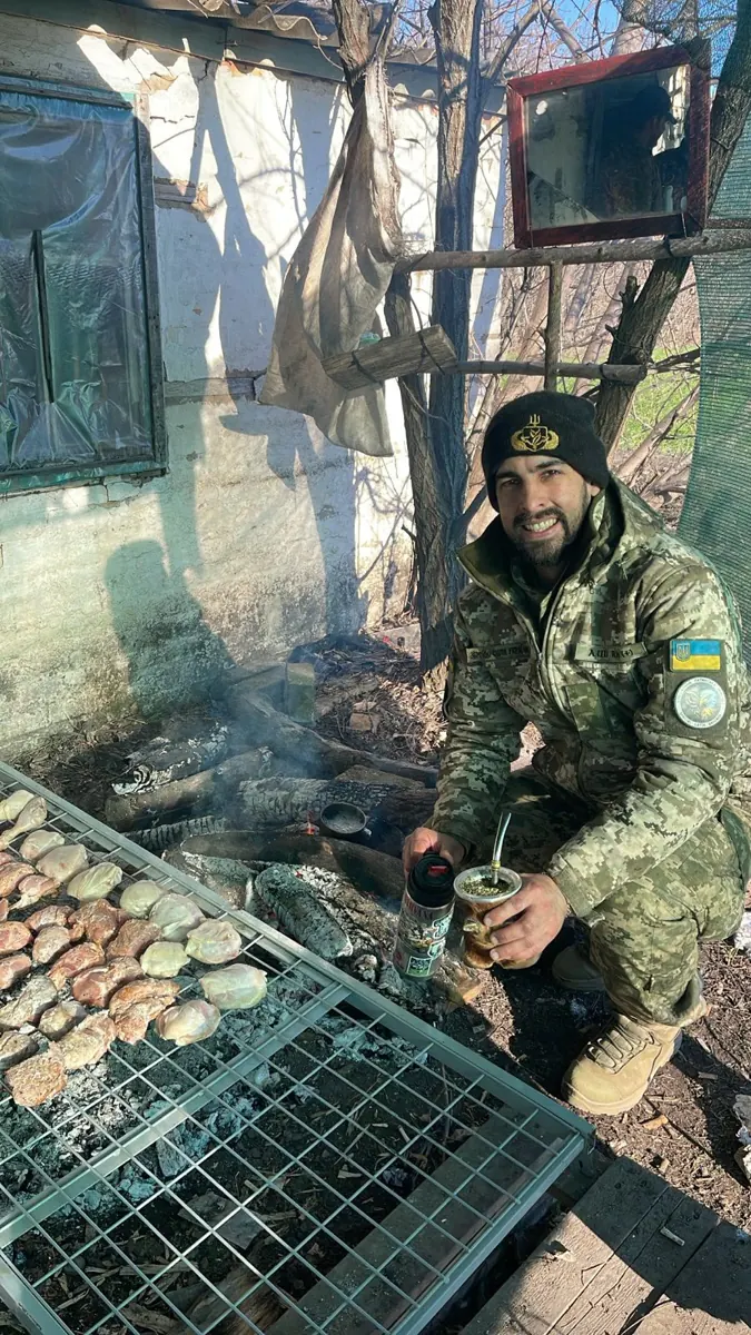 A soldier the association helps, by the fire
